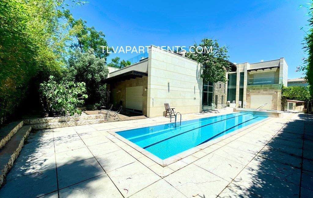 A luxurious villa with a pool